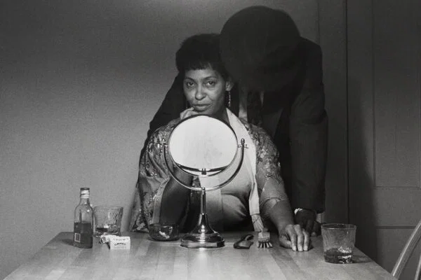 Black and white photo by Carrie Mae Weems from her Kitchen Table Series. From the book Heart of the Matter