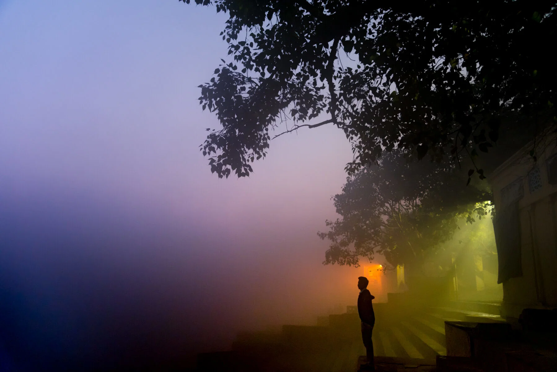 color street photo of fog evening in New Delhi, India by Chetan Verma