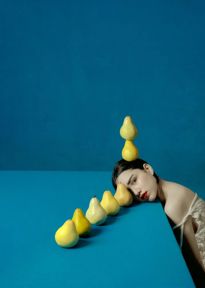color conceptual studio portrait photo of woman with pears by Elena Paraskeva
