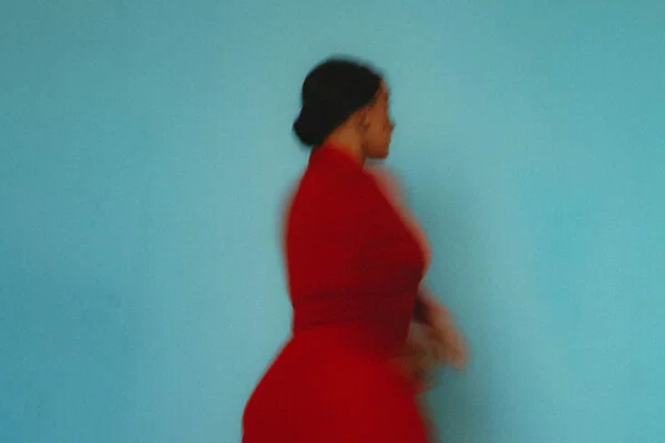 Fine art color portrait of spanish female dancer in red dress by Ingrid Klevmark