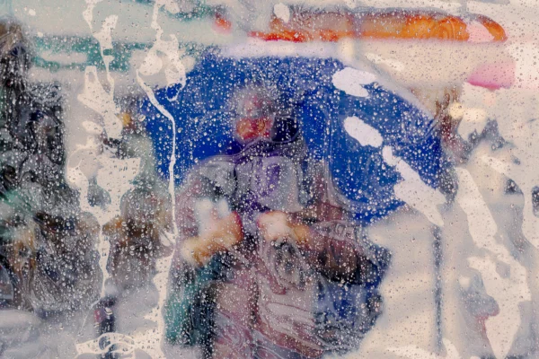 color abstract street photo composition of woman walking in Paris, France by Victor Feillant