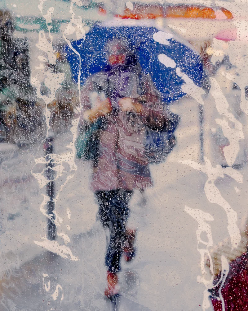 color abstract street photo composition of woman walking in Paris, France by Victor Feillant