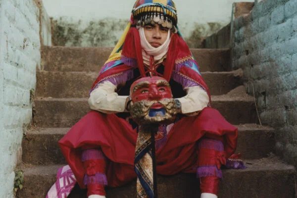 color portrait photo of young man wearing traditional costume in Salvador by Benjamin Eagle