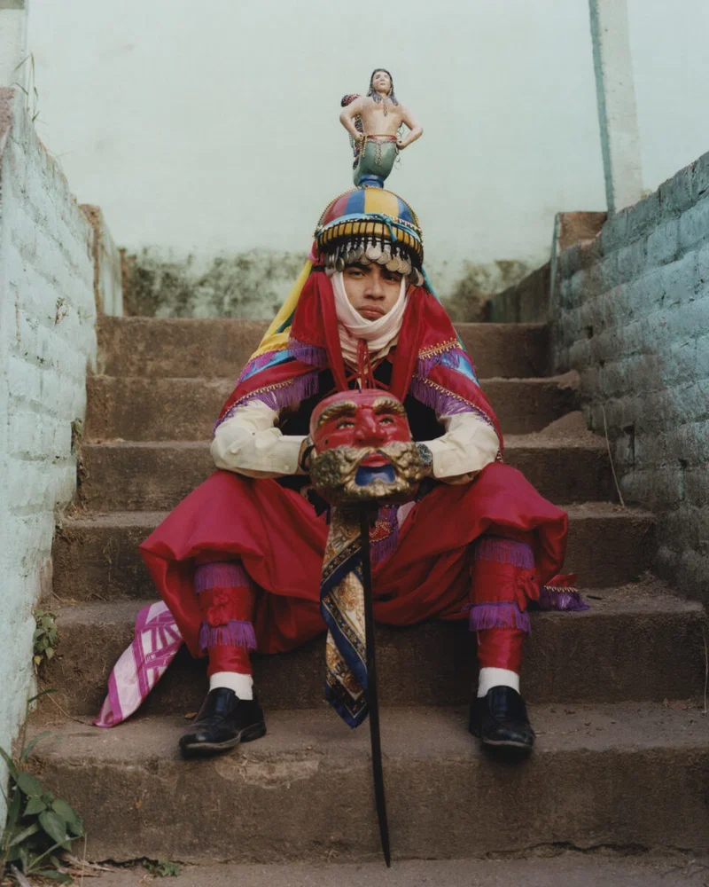 color portrait photo of young man wearing traditional costume in Salvador by Benjamin Eagle