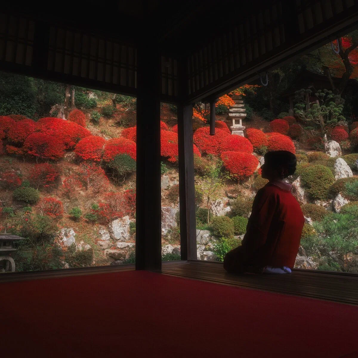 color travel photo of woman in temple in Japan by Daniel Kordan
