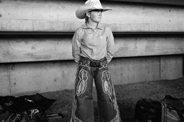 black and white portrait photo of young female horse rider in Australia by Nigel Malone