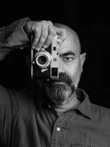 black and white portrait photo of Indian photographer Vineet Vohra