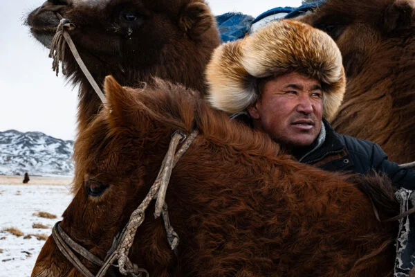 color travel photo of Kazakh family across the Mongolian steppe by Francesca Lanfranchi