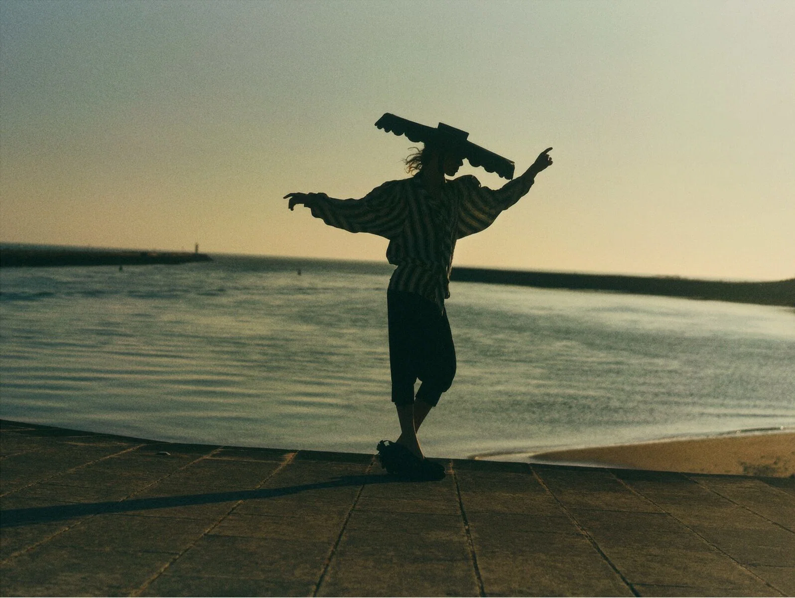 color fashion landscape portrait of woman on horizon by Amélie Ambroise