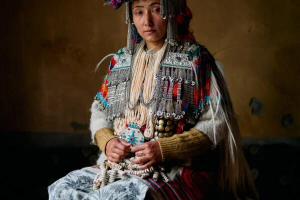 Color travel portrait photo of Dolma woman in Ladakh, India by August Henley Ashmun