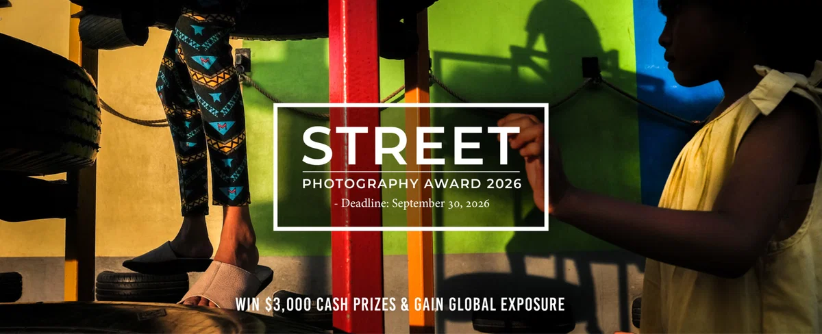 colorful street photo of children in playground by Victor Djaja