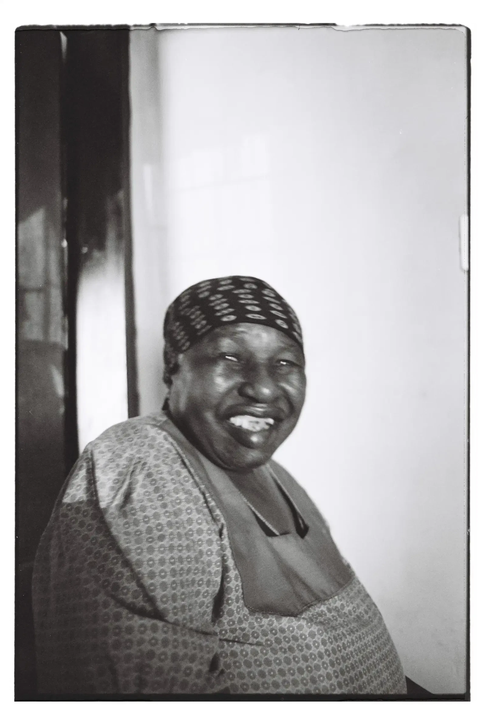 Portrait of uGogo(Grandma) in her home by Lamont Khoza
