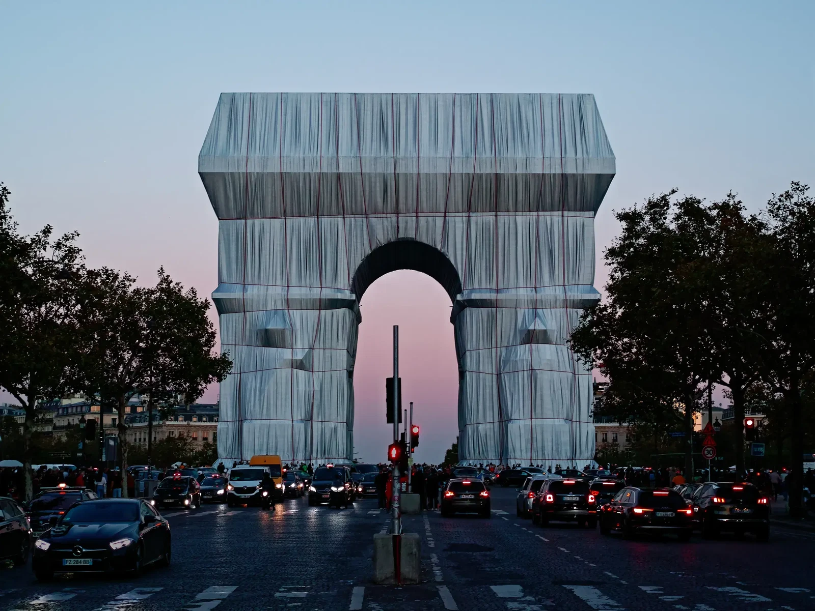 Arc Triomphe Christo in the Evening by Helmut Lochbuehler